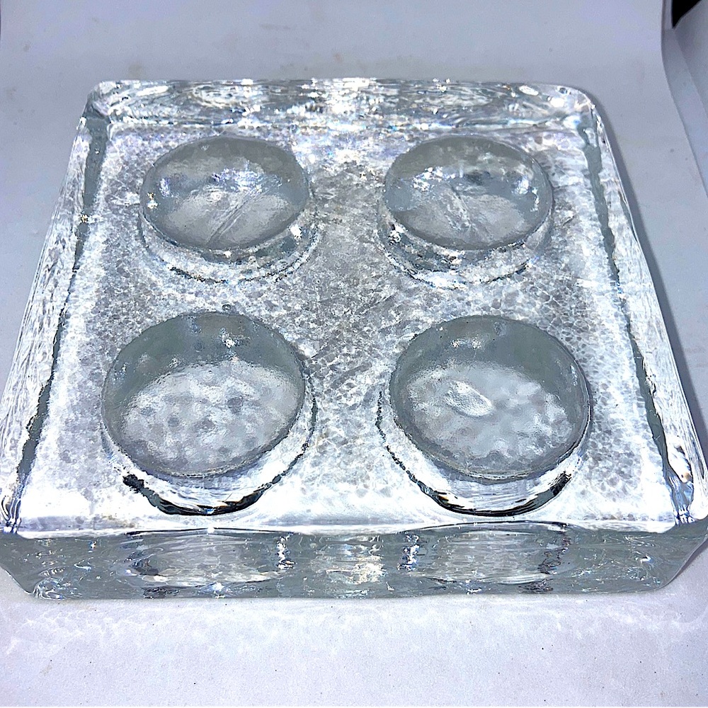 Crate & Barrel -Quattro mcm style 
Thick clear glass tea light candle holder